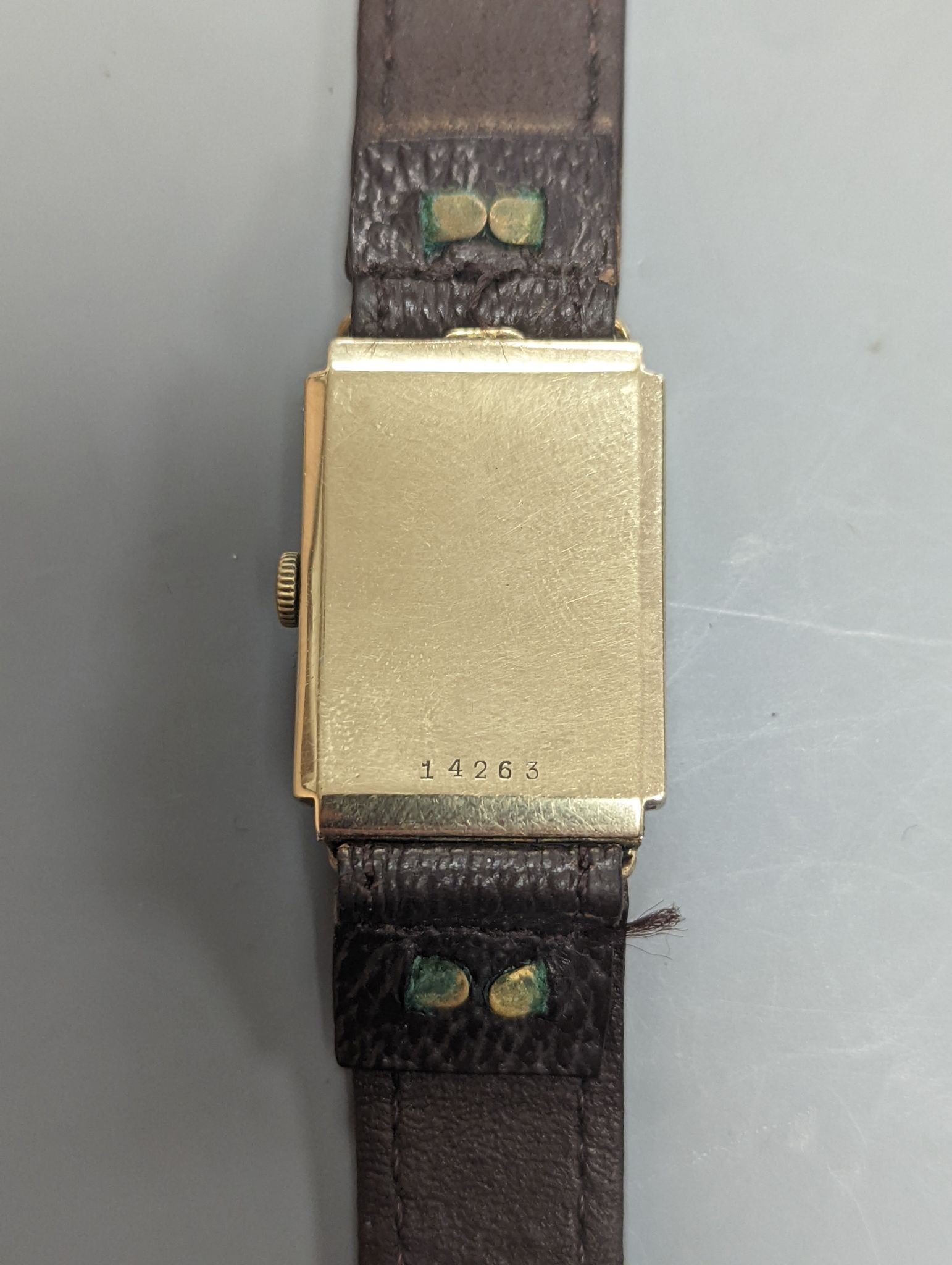 A gentleman's 1930's 9ct gold rectangular dial manual wind gold wrist watch.